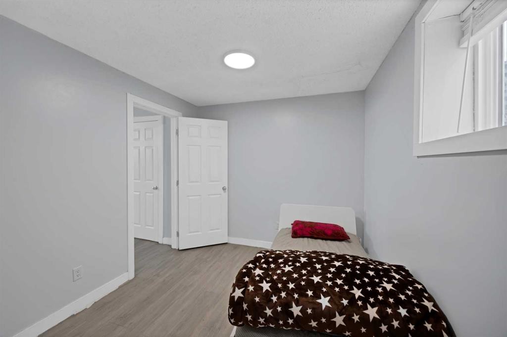 218 Saddlefield Place Ne, Calgary, AB - Indoor Photo Showing Bedroom