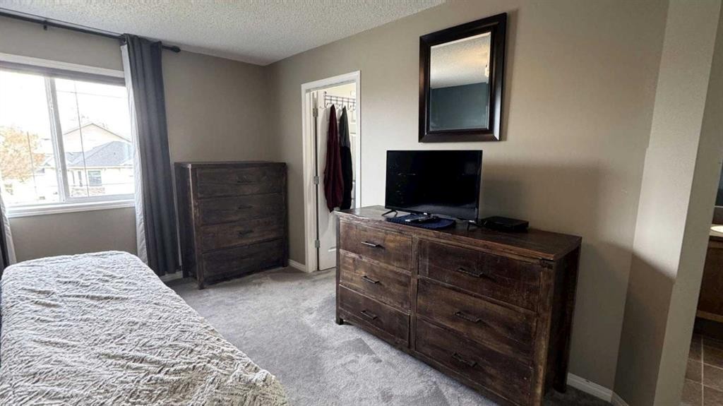 379 Cimarron Boulevard, Okotoks, AB