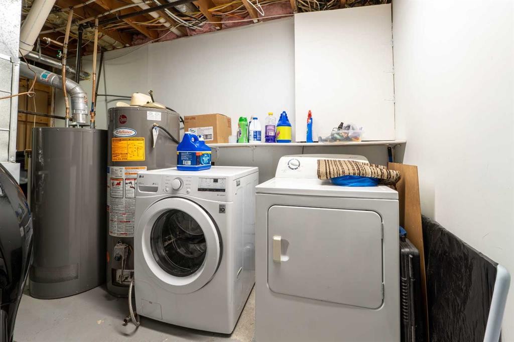 27 Erin Grove Court Se, Calgary, AB - Indoor Photo Showing Laundry Room