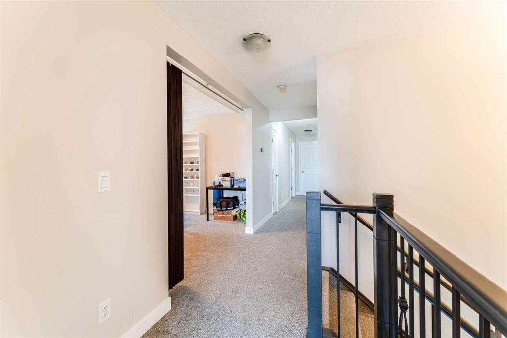 42 Buckskin Way, Cochrane, AB - Indoor Photo Showing Other Room
