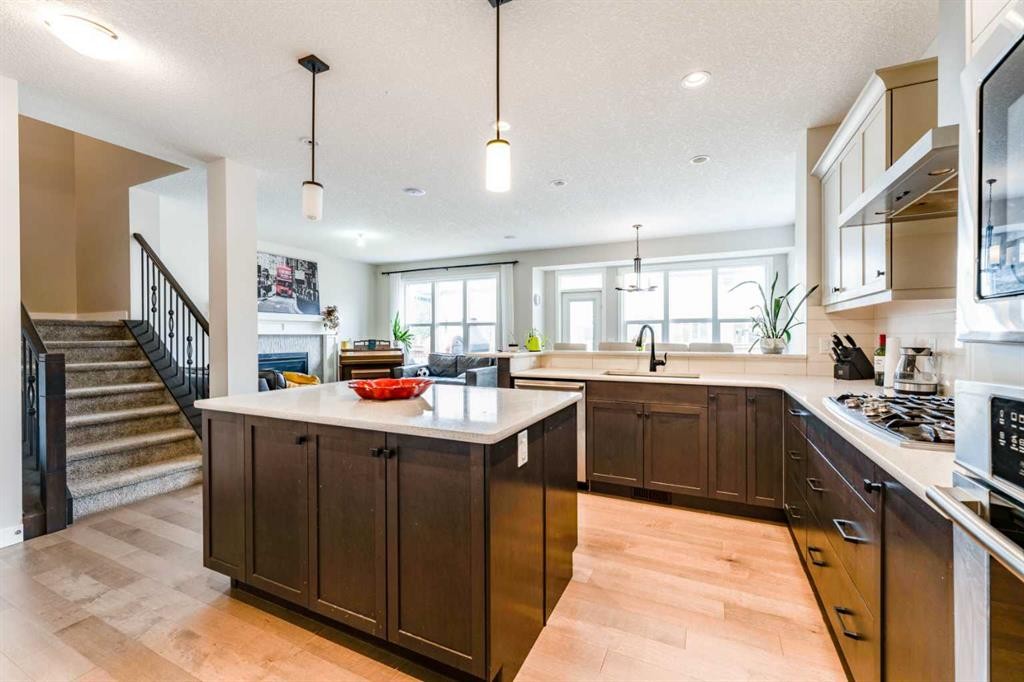 42 Buckskin Way, Cochrane, AB - Indoor Photo Showing Kitchen With Upgraded Kitchen