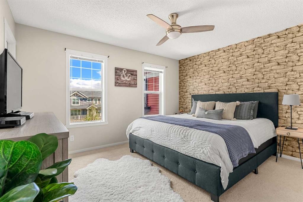 40 Sunvalley Road, Cochrane, AB - Indoor Photo Showing Bedroom