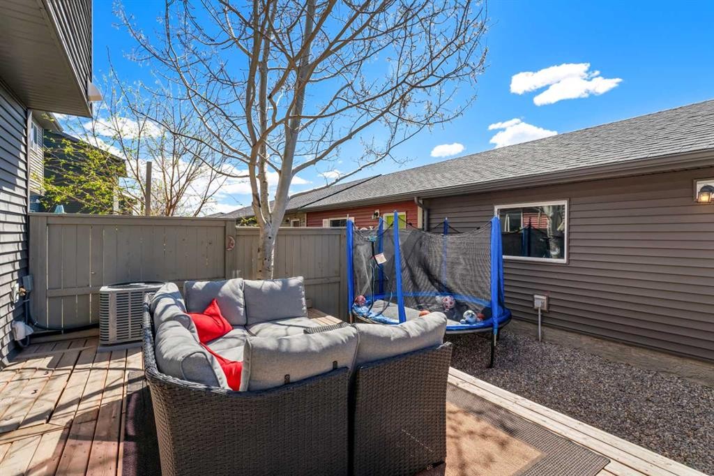 40 Sunvalley Road, Cochrane, AB - Outdoor With Deck Patio Veranda With Exterior
