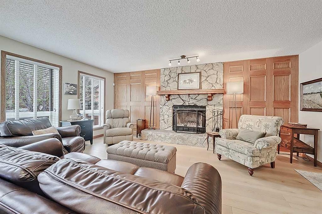 42 Sundown Close Se, Calgary, AB - Indoor Photo Showing Living Room With Fireplace