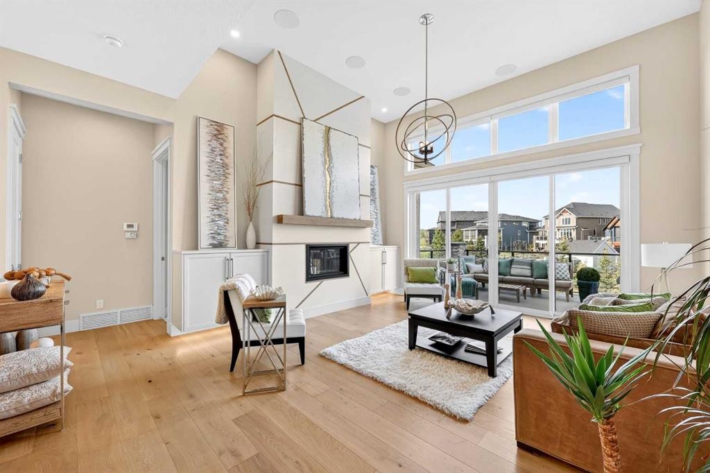 45 Cranbrook Rise Se, Calgary, AB - Indoor Photo Showing Living Room With Fireplace