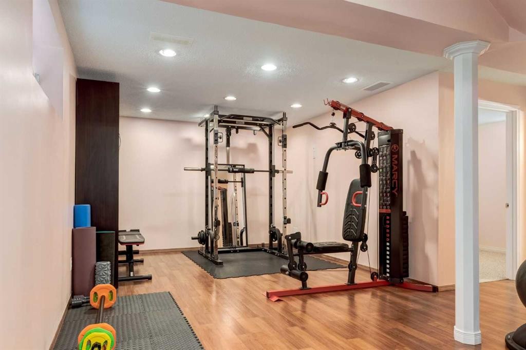 324 Evermeadow Road Sw, Calgary, AB - Indoor Photo Showing Gym Room