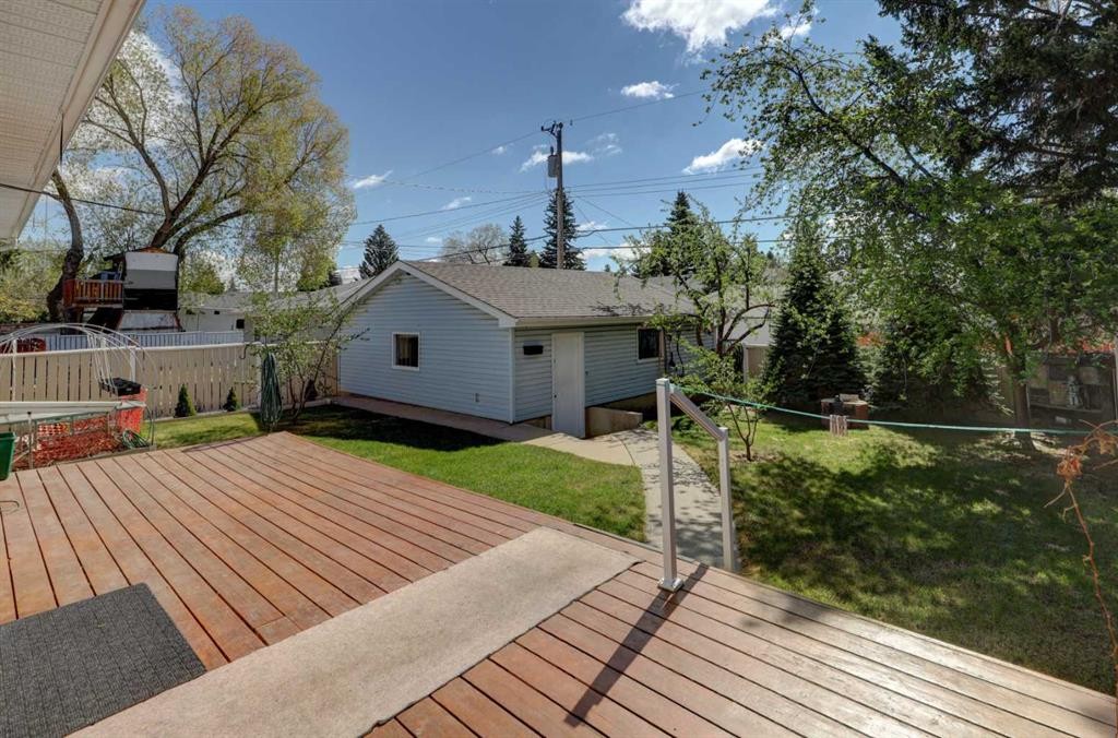 255 Huntcroft Road Ne, Calgary, AB - Outdoor With Deck Patio Veranda