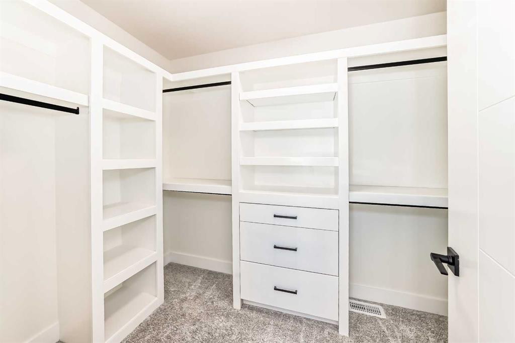 407 Rivercrest Road, Cochrane, AB - Indoor With Storage