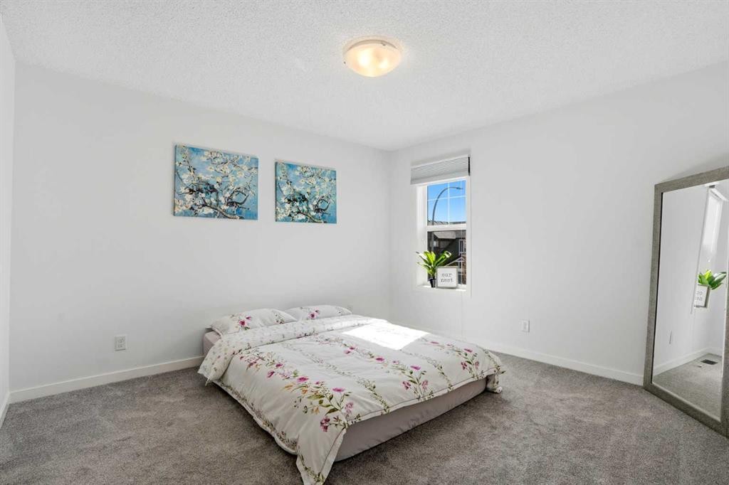 314 Auburn Crest Way Se, Calgary, AB - Indoor Photo Showing Bedroom