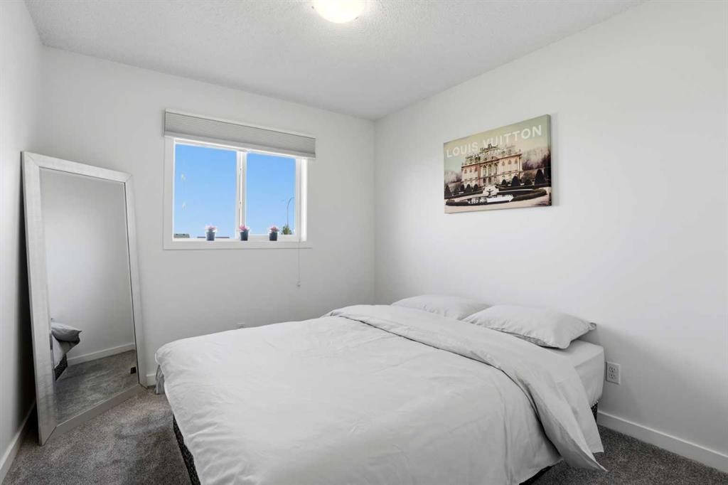 314 Auburn Crest Way Se, Calgary, AB - Indoor Photo Showing Bedroom