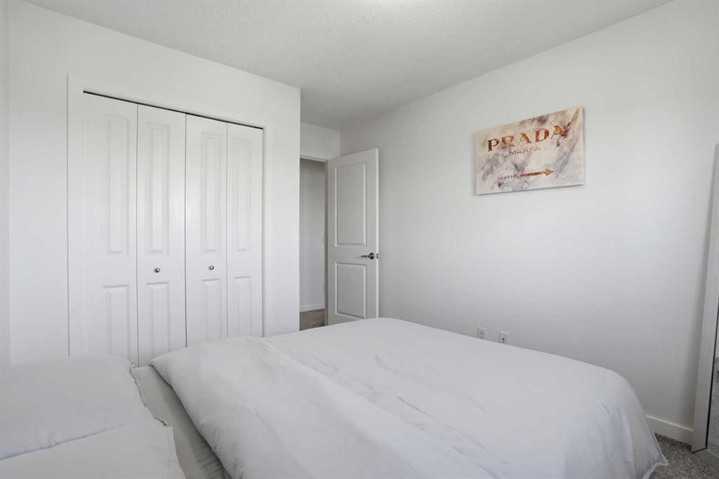 314 Auburn Crest Way Se, Calgary, AB - Indoor Photo Showing Bedroom