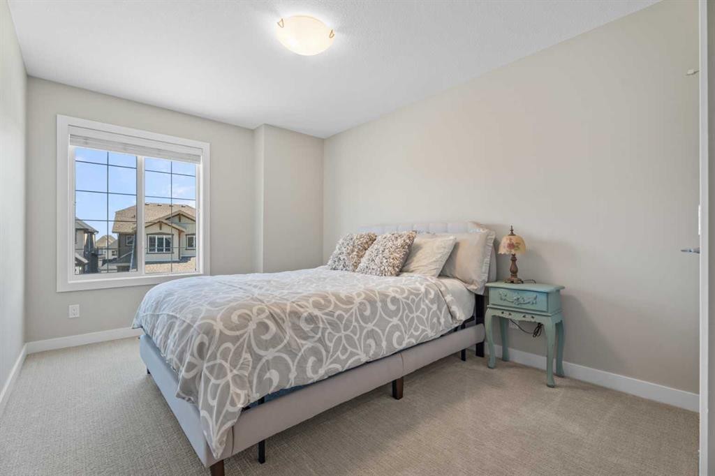 19 Masters Mews Se, Calgary, AB - Indoor Photo Showing Bedroom