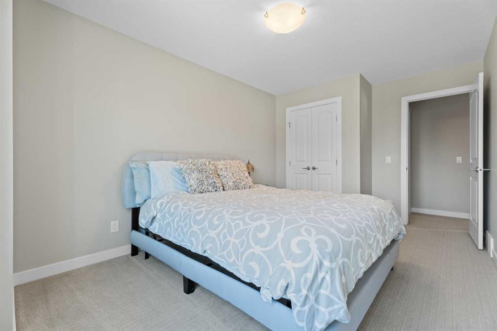 19 Masters Mews Se, Calgary, AB - Indoor Photo Showing Bedroom