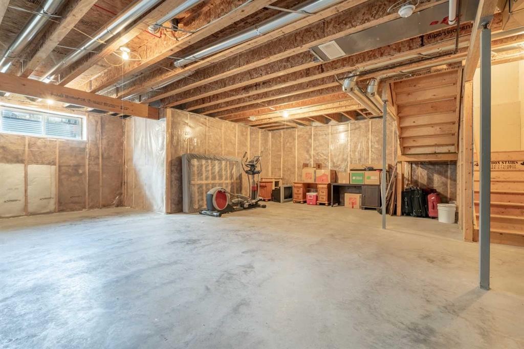19 Masters Mews Se, Calgary, AB - Indoor Photo Showing Basement