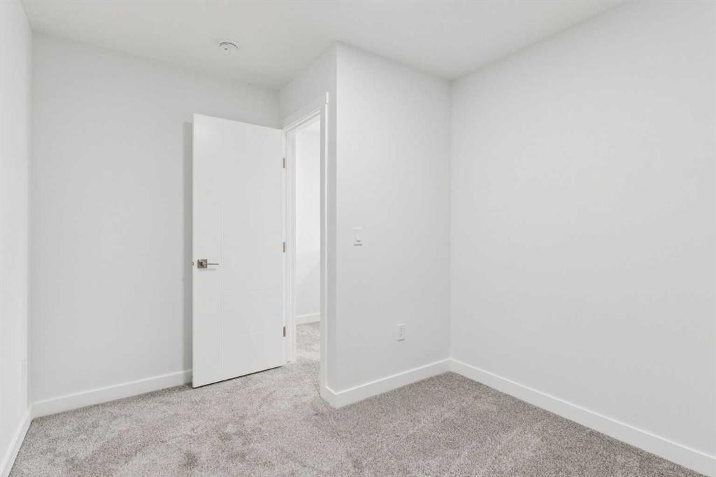 202-95 Saddlecrest Circle Ne, Calgary, AB - Indoor Photo Showing Other Room
