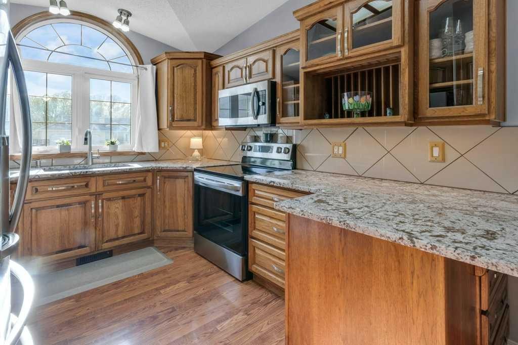 13A Westlynn Drive, Claresholm, AB - Indoor Photo Showing Kitchen With Stainless Steel Kitchen