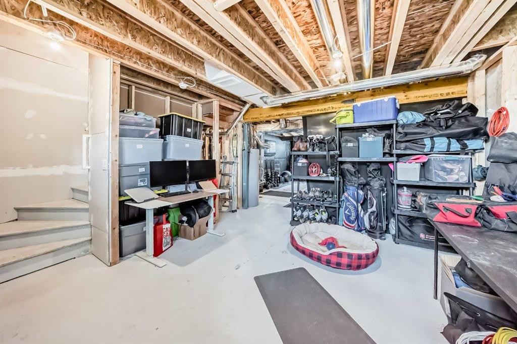 3 Agate, Cochrane, AB - Indoor Photo Showing Basement