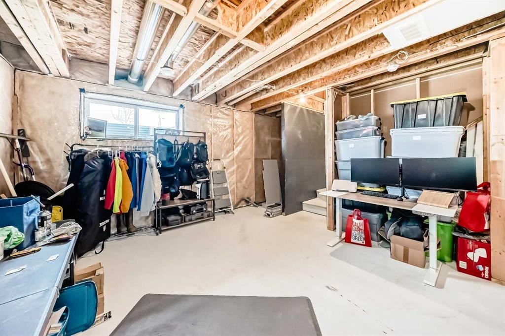 3 Agate, Cochrane, AB - Indoor Photo Showing Basement
