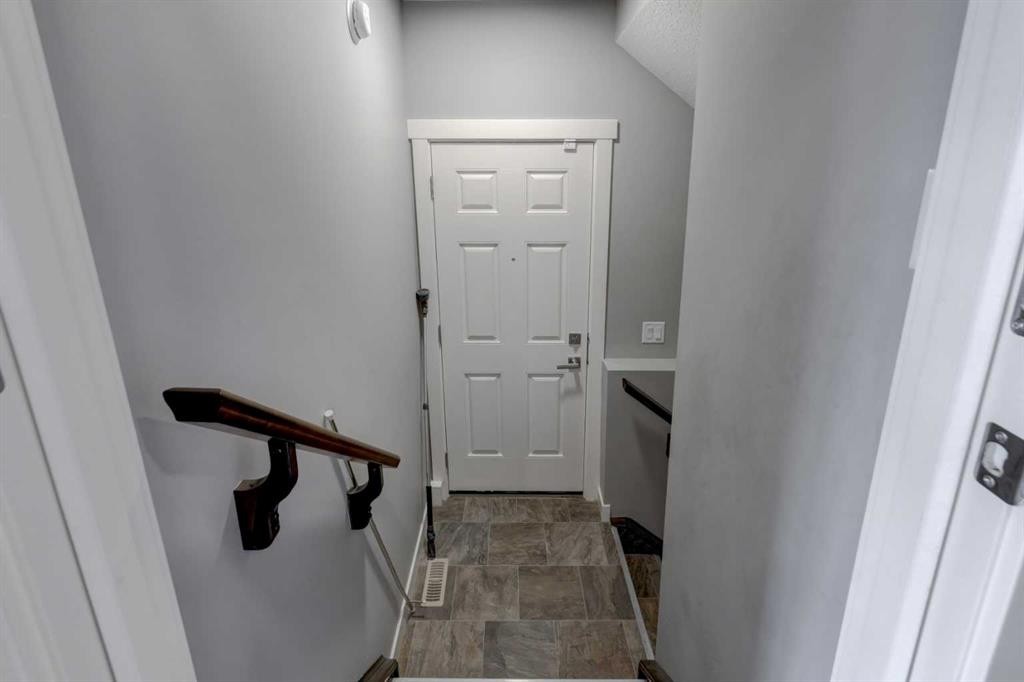 154 Amblehurst Way Nw, Calgary, AB - Indoor Photo Showing Other Room