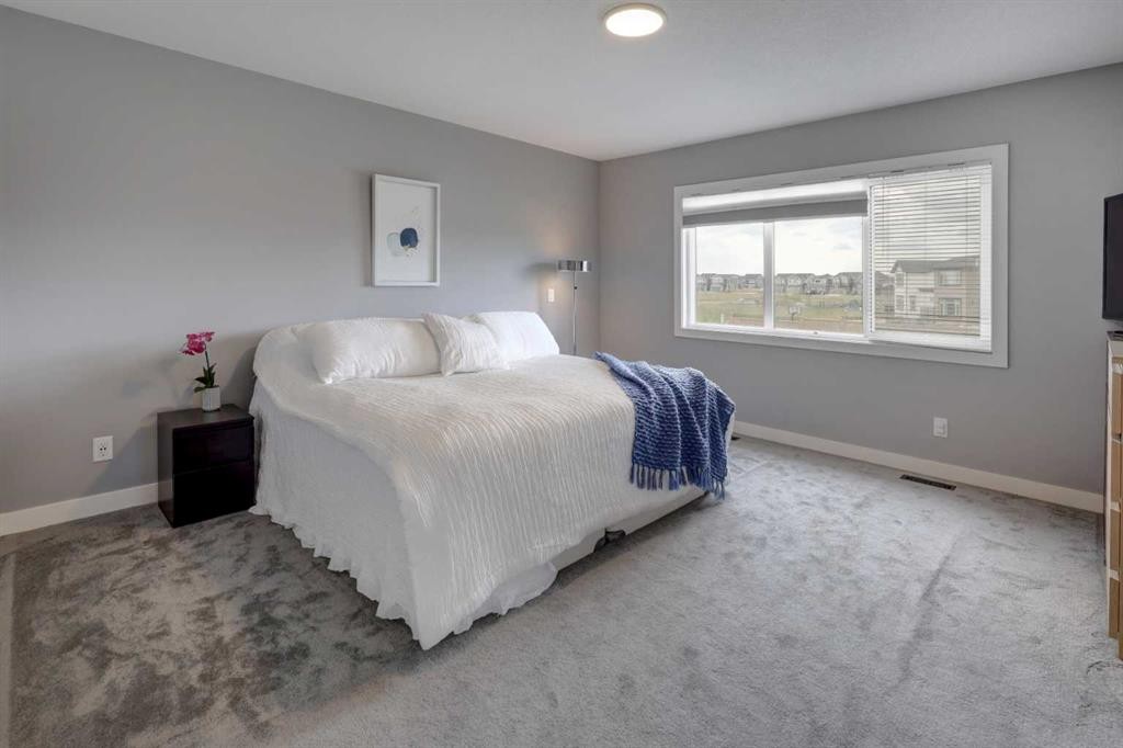 154 Amblehurst Way Nw, Calgary, AB - Indoor Photo Showing Bedroom