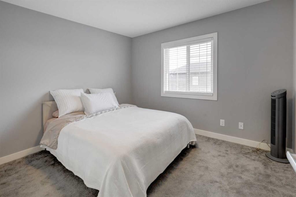 154 Amblehurst Way Nw, Calgary, AB - Indoor Photo Showing Bedroom