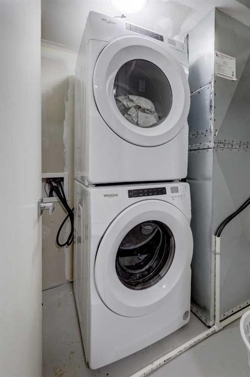 154 Amblehurst Way Nw, Calgary, AB - Indoor Photo Showing Laundry Room