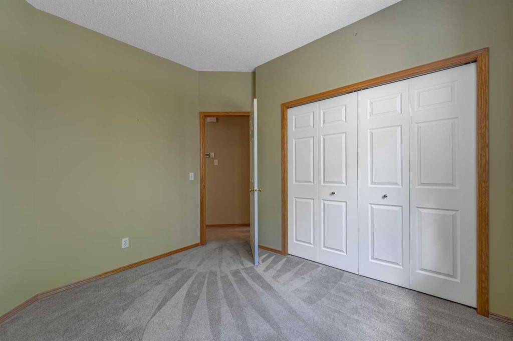 44 Prestwick Pond Terrace Se, Calgary, AB - Indoor Photo Showing Other Room