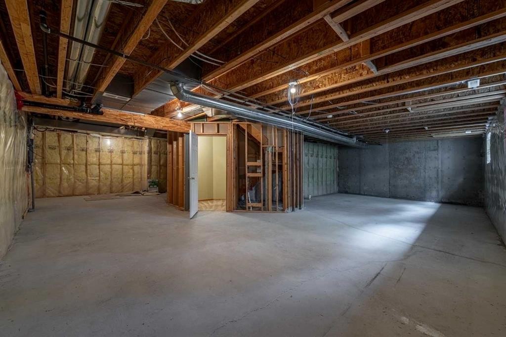 44 Prestwick Pond Terrace Se, Calgary, AB - Indoor Photo Showing Basement