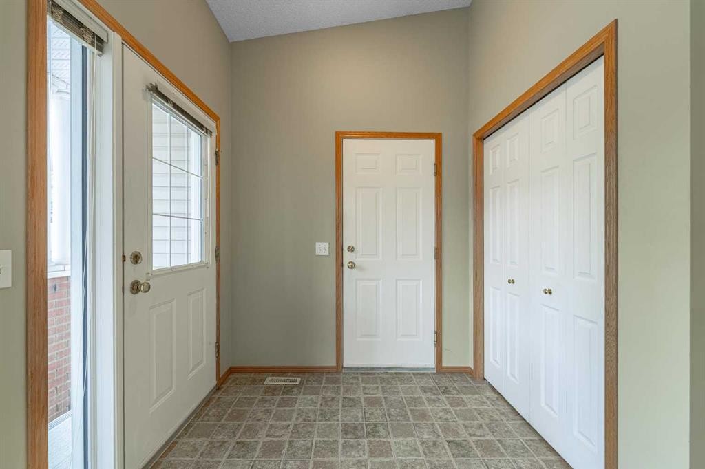 44 Prestwick Pond Terrace Se, Calgary, AB - Indoor Photo Showing Other Room