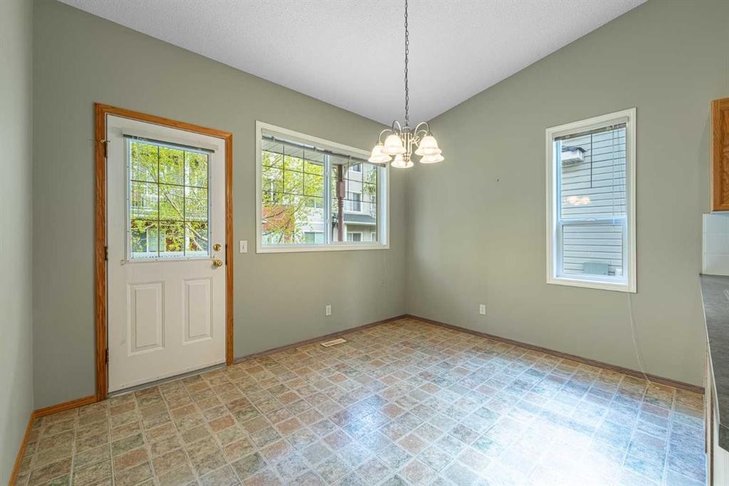 44 Prestwick Pond Terrace Se, Calgary, AB - Indoor Photo Showing Other Room