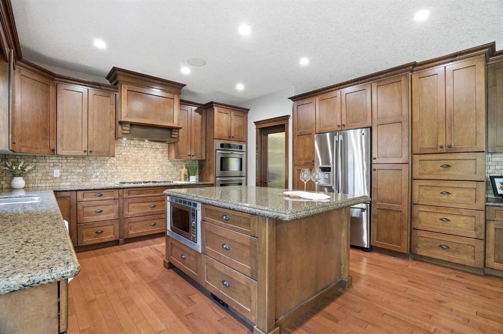 149 Aspen Glen Place Sw, Calgary, AB - Indoor Photo Showing Kitchen With Stainless Steel Kitchen With Upgraded Kitchen