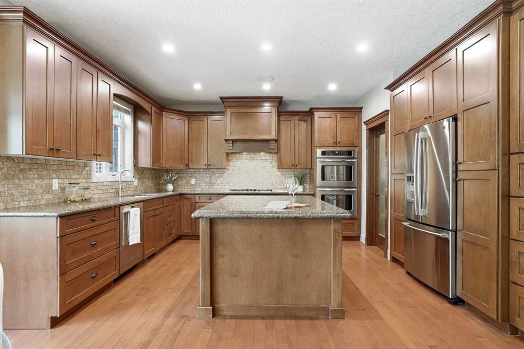 149 Aspen Glen Place Sw, Calgary, AB - Indoor Photo Showing Kitchen With Stainless Steel Kitchen With Upgraded Kitchen