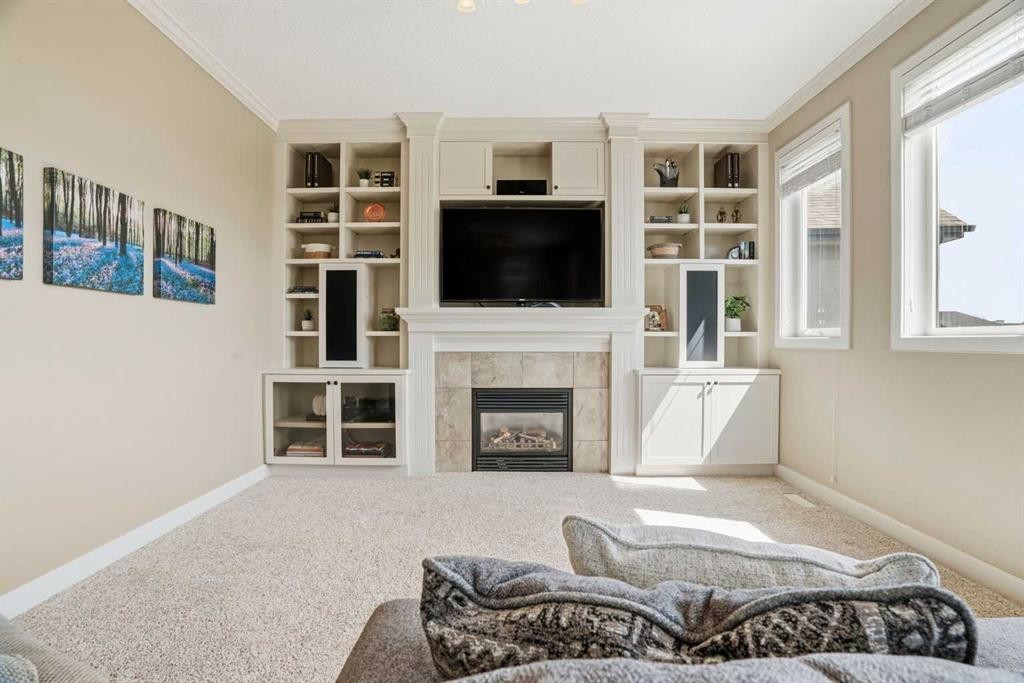 149 Aspen Glen Place Sw, Calgary, AB - Indoor With Fireplace