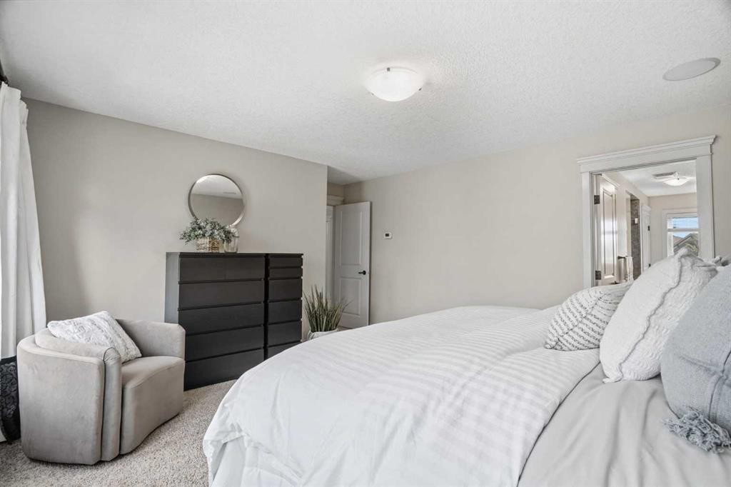 149 Aspen Glen Place Sw, Calgary, AB - Indoor Photo Showing Bedroom