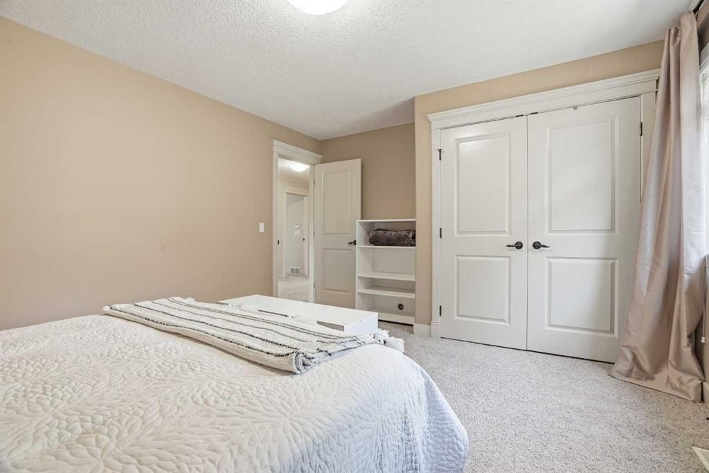 149 Aspen Glen Place Sw, Calgary, AB - Indoor Photo Showing Bedroom