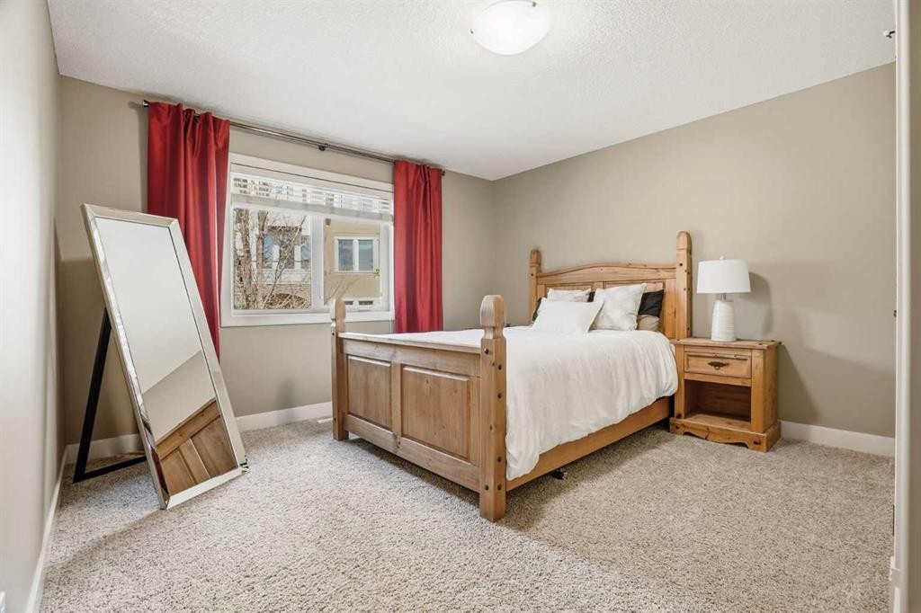 149 Aspen Glen Place Sw, Calgary, AB - Indoor Photo Showing Bedroom