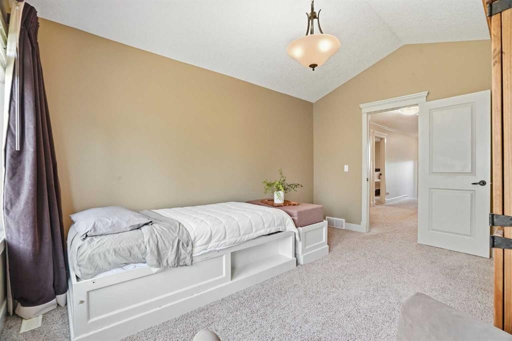 149 Aspen Glen Place Sw, Calgary, AB - Indoor Photo Showing Bedroom