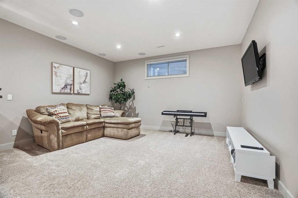 149 Aspen Glen Place Sw, Calgary, AB - Indoor Photo Showing Other Room