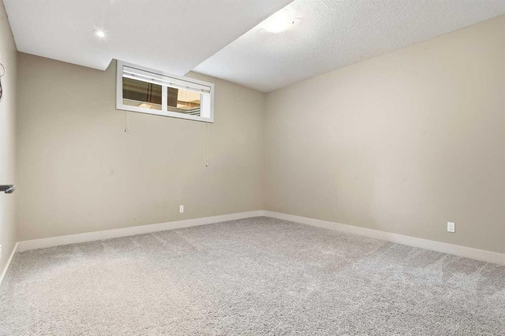149 Aspen Glen Place Sw, Calgary, AB - Indoor Photo Showing Other Room