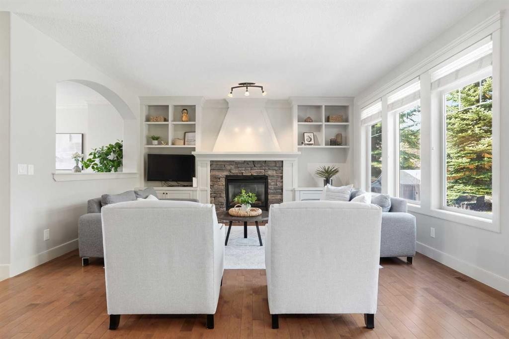 149 Aspen Glen Place Sw, Calgary, AB - Indoor Photo Showing Living Room With Fireplace