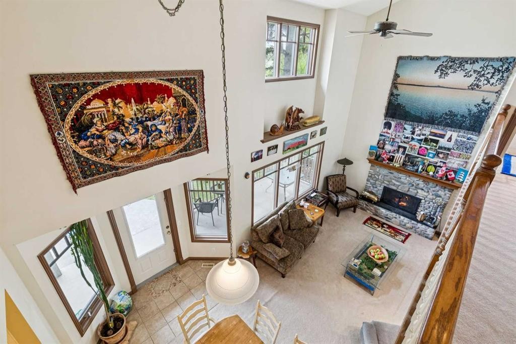 361 Wildwood Drive Sw, Calgary, AB - Indoor Photo Showing Other Room With Fireplace
