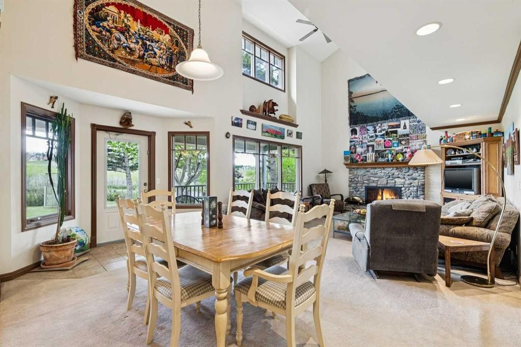 361 Wildwood Drive Sw, Calgary, AB - Indoor Photo Showing Dining Room With Fireplace