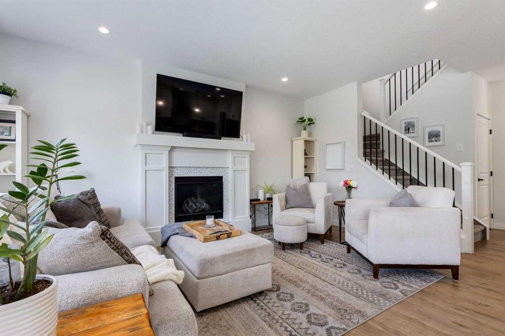 77 Walgrove Gardens Se, Calgary, AB - Indoor Photo Showing Living Room With Fireplace