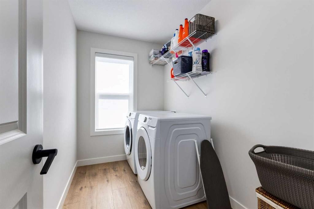 77 Walgrove Gardens Se, Calgary, AB - Indoor Photo Showing Laundry Room