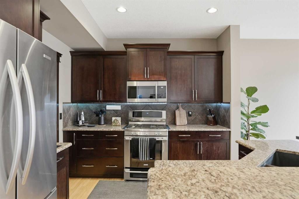 44 Westridge Crescent, Okotoks, AB - Indoor Photo Showing Kitchen With Stainless Steel Kitchen