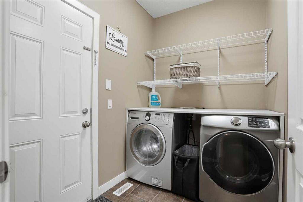 44 Westridge Crescent, Okotoks, AB - Indoor Photo Showing Laundry Room