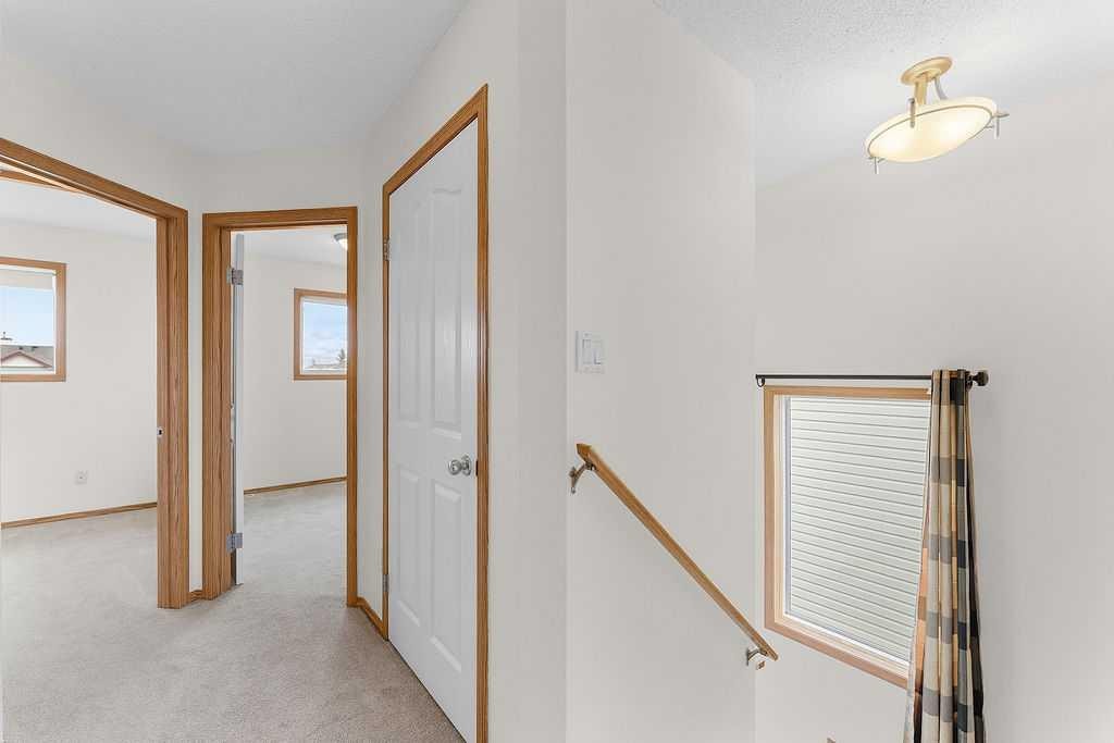 108 Everstone Rise Sw, Calgary, AB - Indoor Photo Showing Other Room