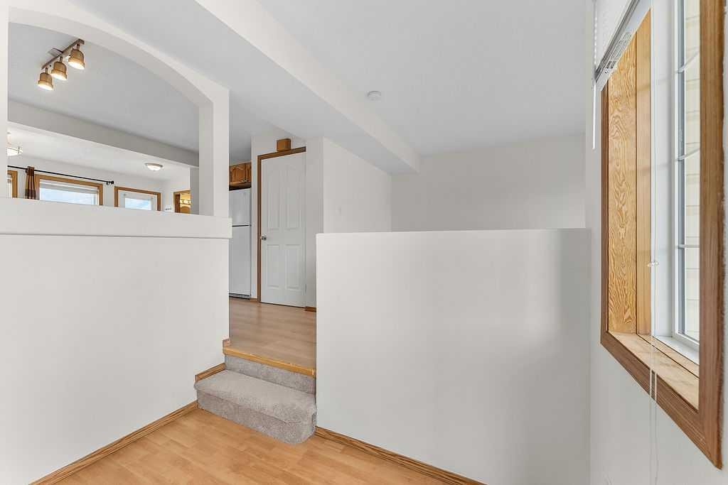 108 Everstone Rise Sw, Calgary, AB - Indoor Photo Showing Other Room