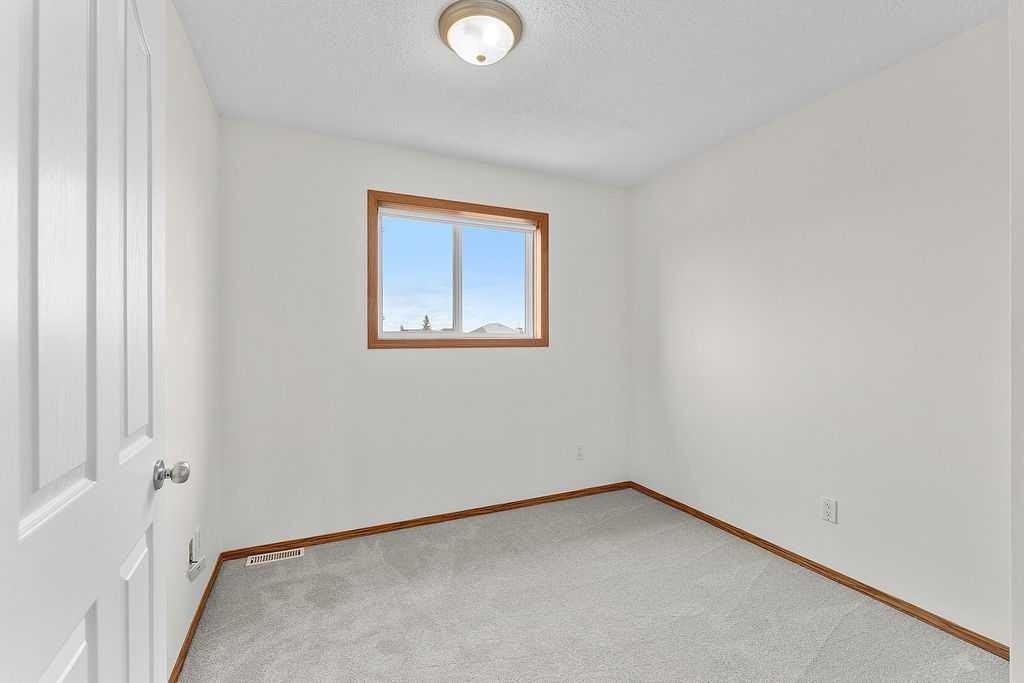 108 Everstone Rise Sw, Calgary, AB - Indoor Photo Showing Other Room
