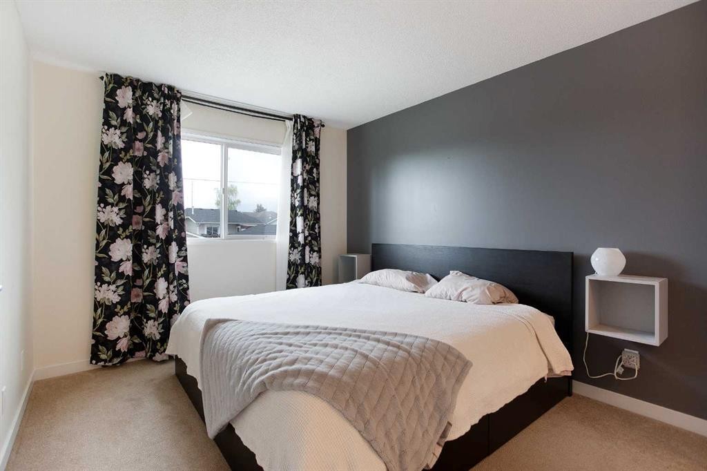 2420 Riverstone Road Se, Calgary, AB - Indoor Photo Showing Bedroom